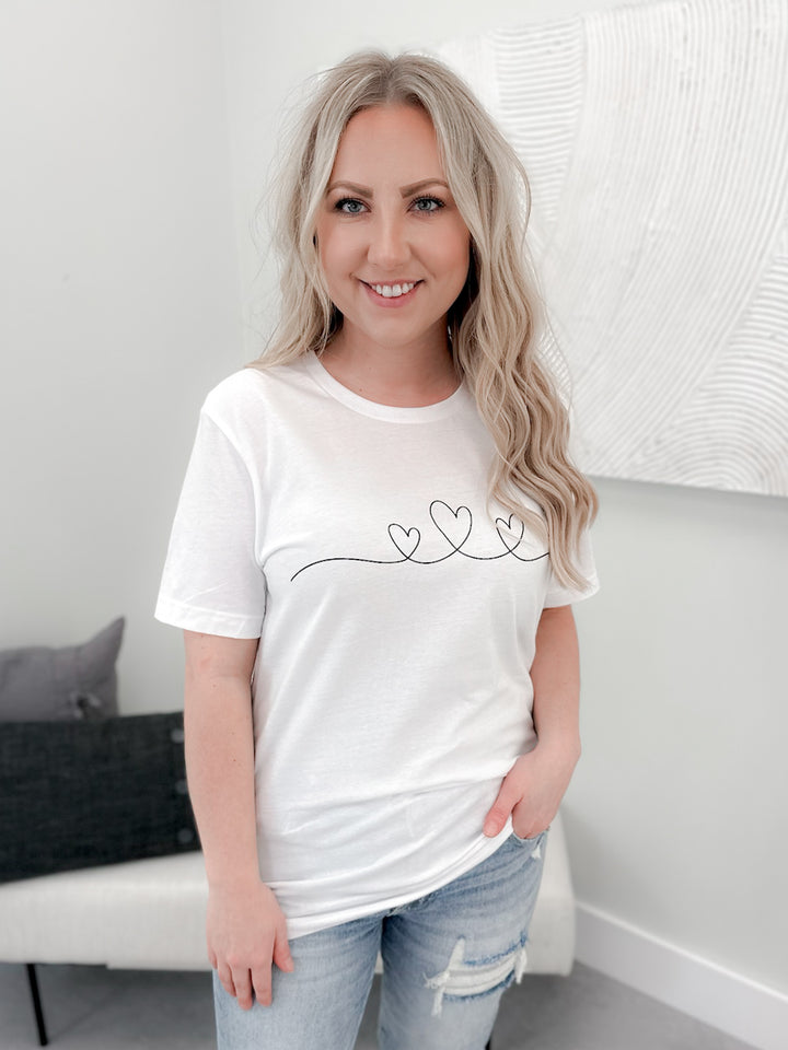 Heart On The Line Tee in White by Ash + Antler