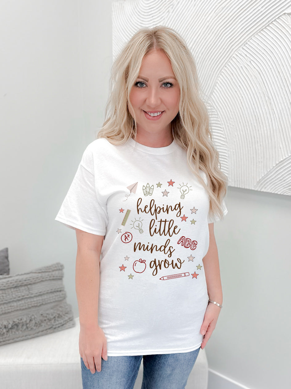 Helping Little Minds Grow Graphix Tee